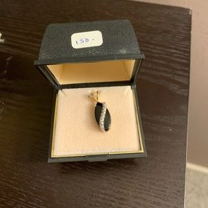 Diamond, onyx and gold pendant